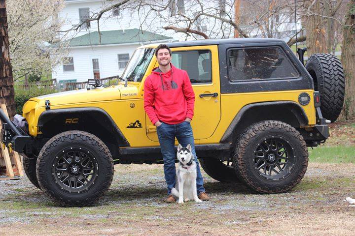 Yellow Jeep Wrangler JK 2 Door with black fastback hard top